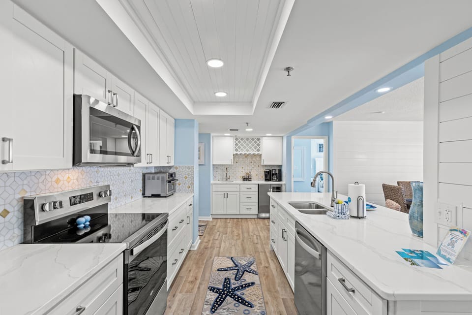 Condo, Multiple Beds, Balcony, Ocean View (Long Beach Resort 2-501) | Private kitchen | Fridge, microwave, oven, stovetop