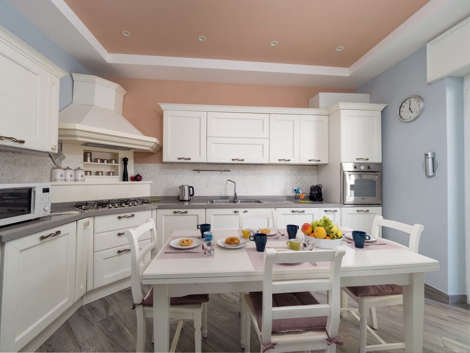 Luxury Apartment, Balcony, Partial Sea View | Private kitchen | Espresso maker, electric kettle