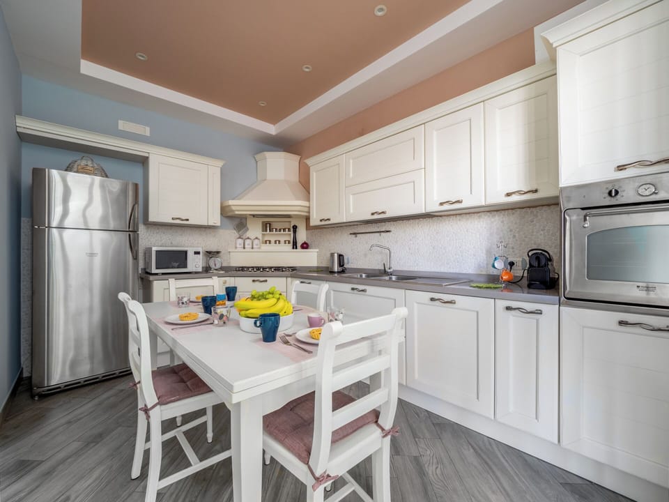 Luxury Apartment, Balcony, Partial Sea View | Private kitchen | Espresso maker, electric kettle