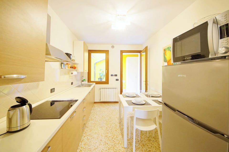 Apartment | Private kitchen | Fridge, microwave, stovetop, dishwasher