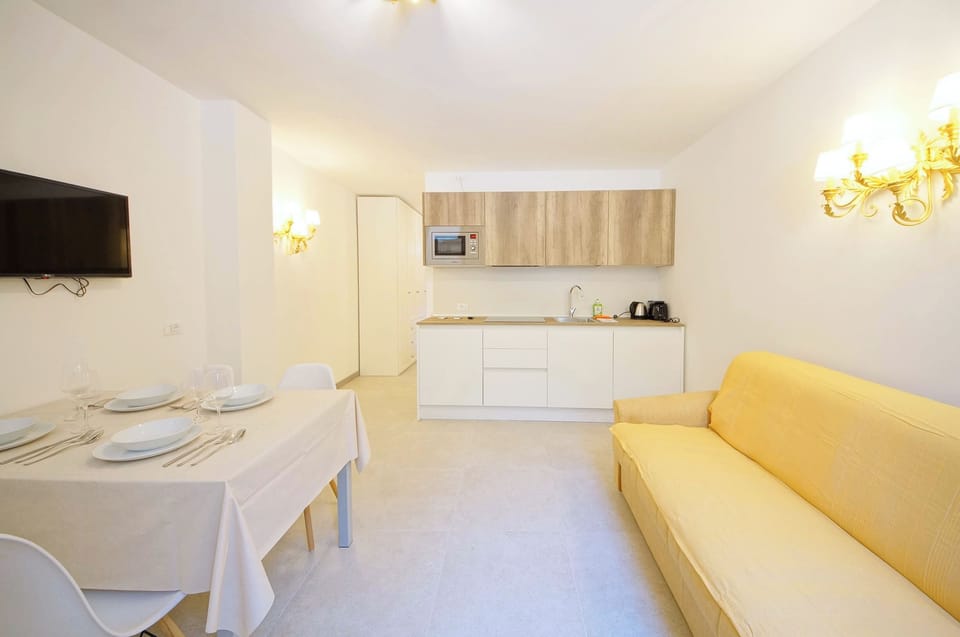 Apartment, Patio | Living area | Flat-screen TV