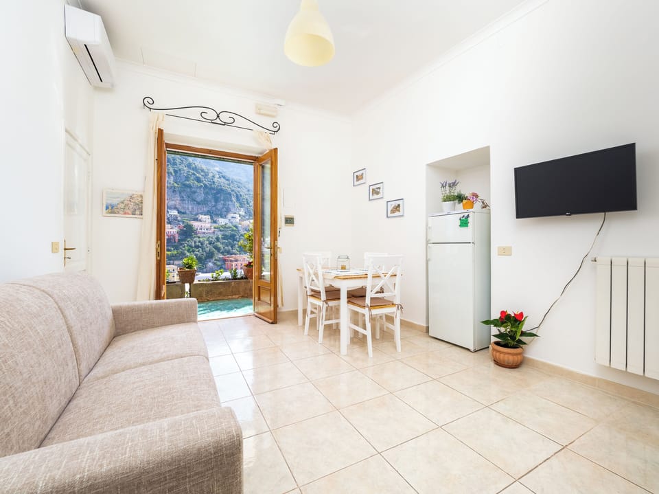 Panoramic House, Sea View | Living area | 40-inch flat-screen TV with digital channels