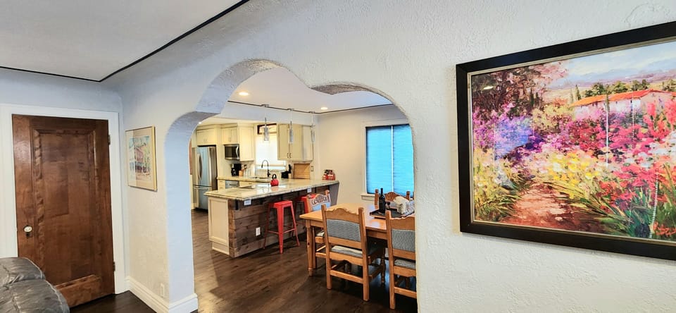Front entrance view of dining/kitchen
