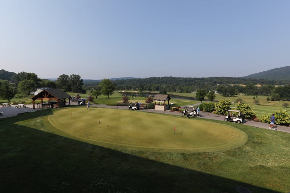 Expansive views of the lush golf course, perfect for taking in the scenery and outdoor activities.