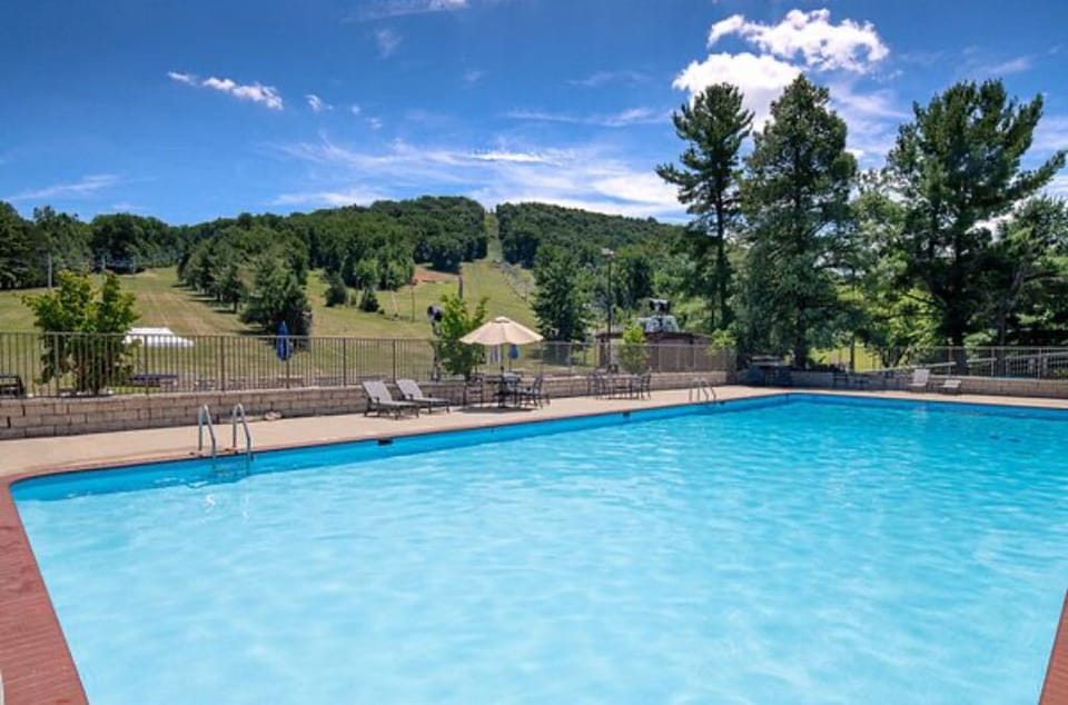 Cool off in the refreshing waters of this scenic outdoor pool, surrounded by rolling hills.