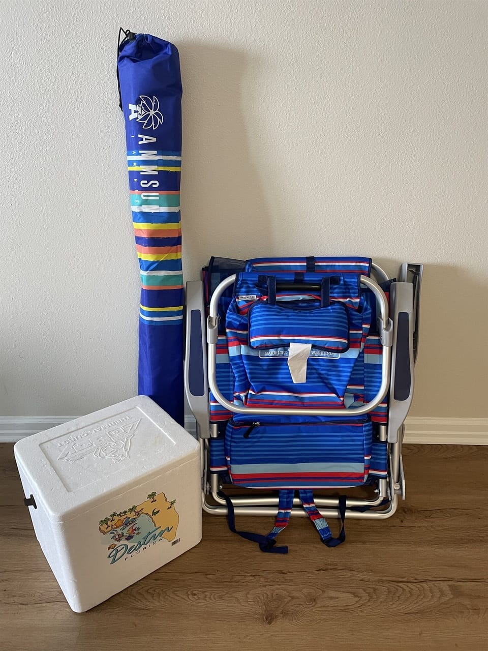 2 beach chairs, cooler and an umbrella provided