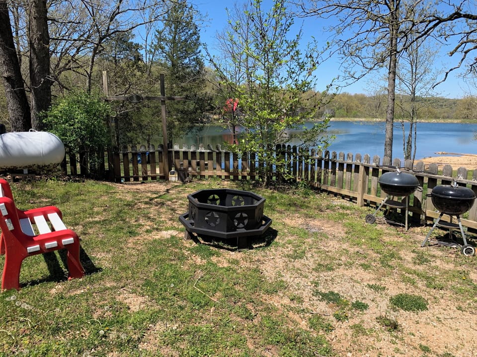 Small enclosed yard connects to the upper deck. Gate opens up to large yard.