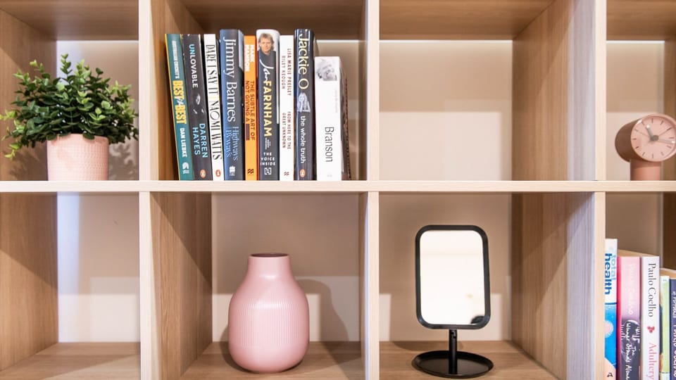 Showcase your favorite books and decor items with stylish, open-timber shelving that adds character to your space.