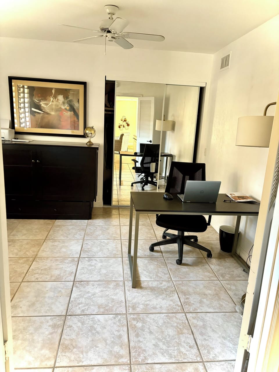 Home office with a queen murphy bed (6" memory foam mattress).