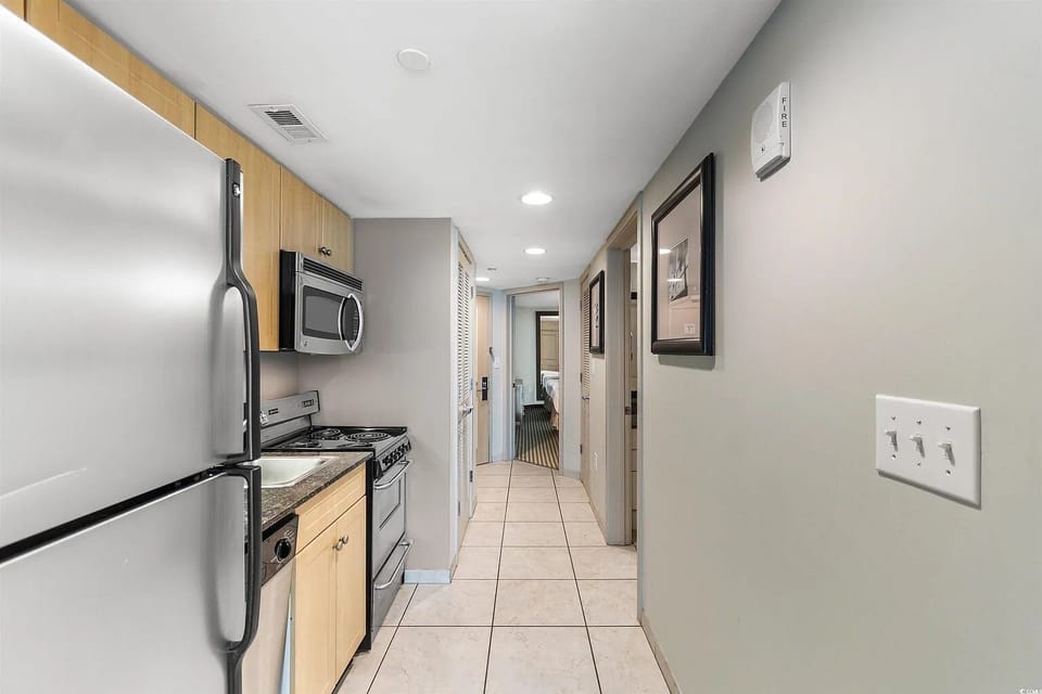 Full kitchen with satainless steel appliances