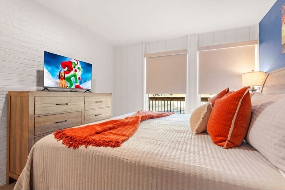 Blackout shades and a large 42 inch Vizio Smart TV complete this bedroom.
