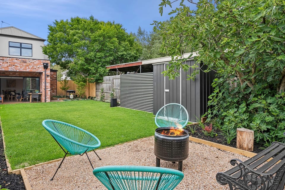 Turfed Backyard & Fire Pit Area