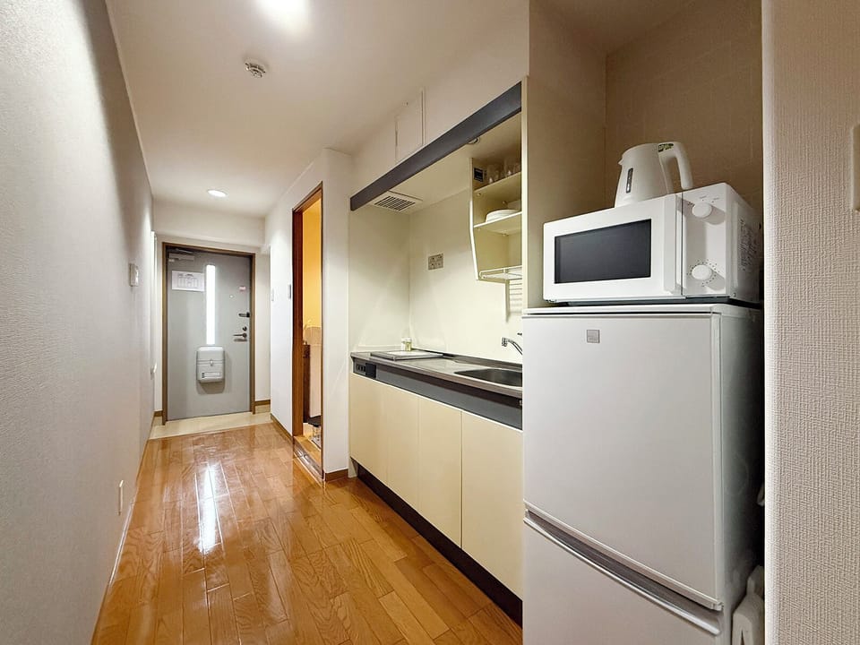 Comfort Apartment, Balcony | Private kitchen | Fridge, microwave, rice cooker, cookware/dishes/utensils