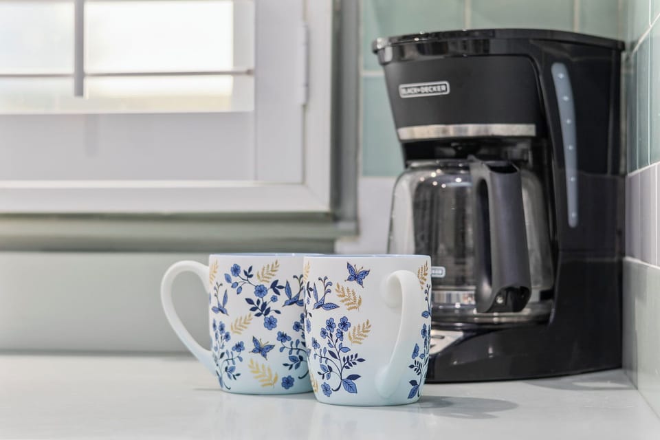 Start your day with a fresh brew from the coffee maker, ready whenever you are.