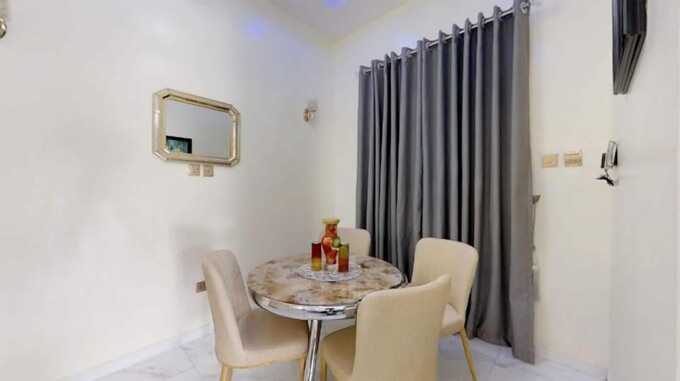 Economy Apartment, Balcony, City View | Dining room