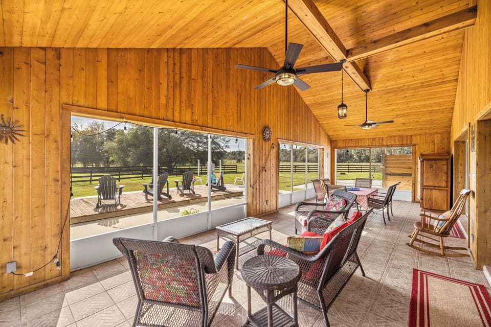 Why spend time indoors when you can spend it in a beautiful screened veranda?
