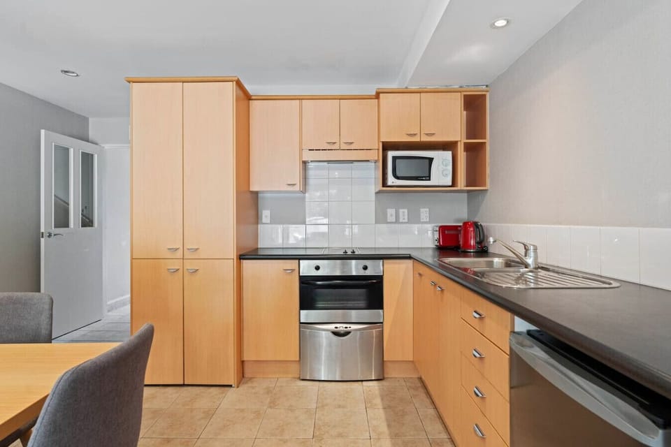 Middle floor - Kitchenette with dishwasher, washing machine inside cupboard