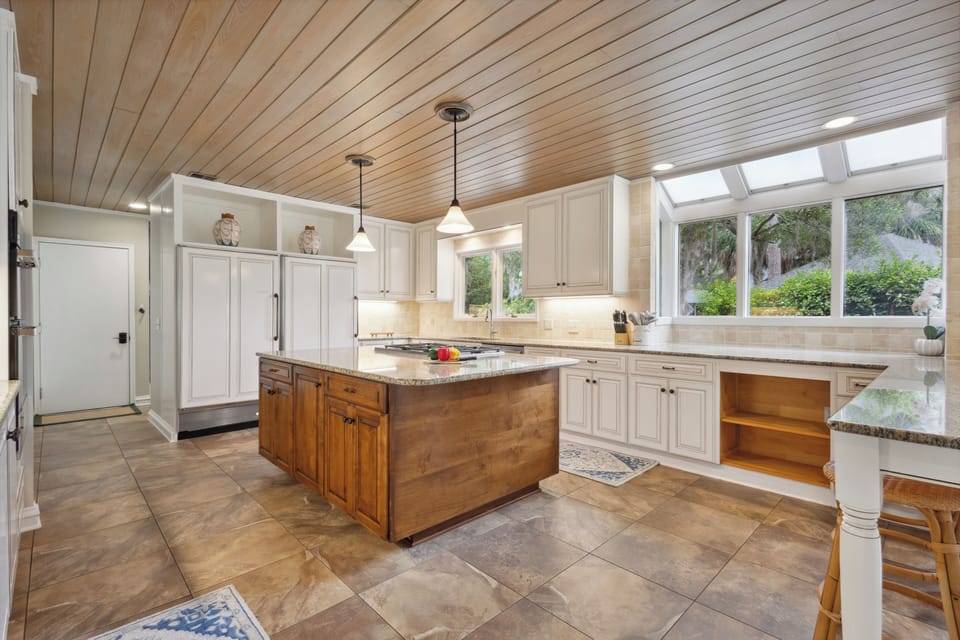 It features an oversized refrigerator and a separate oversized freezer, perfectly designed to meet all your culinary needs.