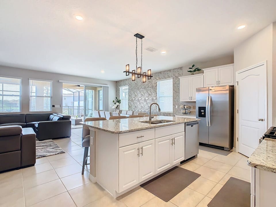 Spacious kitchen with counter seating.