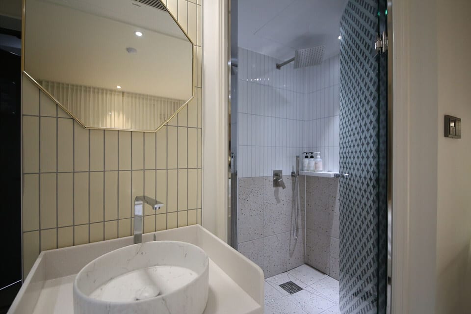 Standard Double Room, City View | Bathroom | Hair dryer, bathrobes, slippers, towels