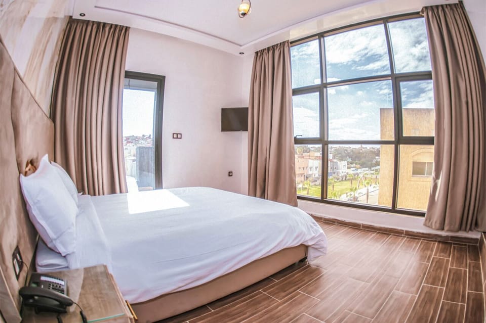 Family Suite, Balcony, City View | Desk, free WiFi, bed sheets