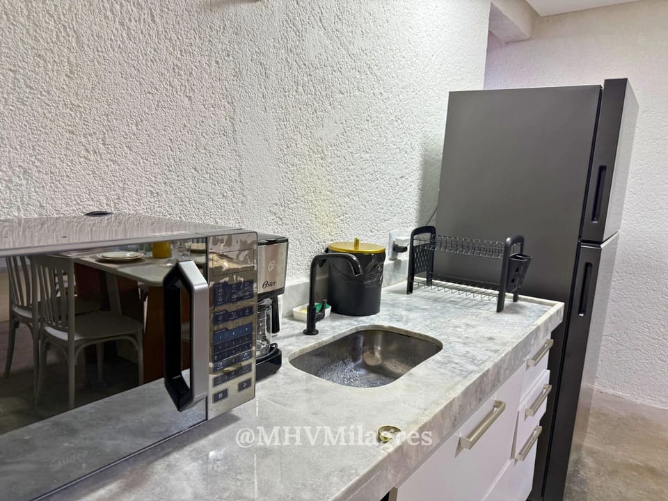 Villa | Private kitchen | Fridge, microwave, cookware/dishes/utensils