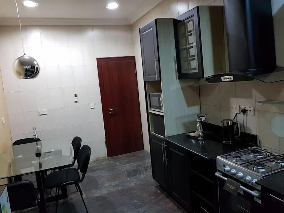 Standard Apartment, Balcony, City View | Private kitchen | Fridge, microwave, oven, stovetop