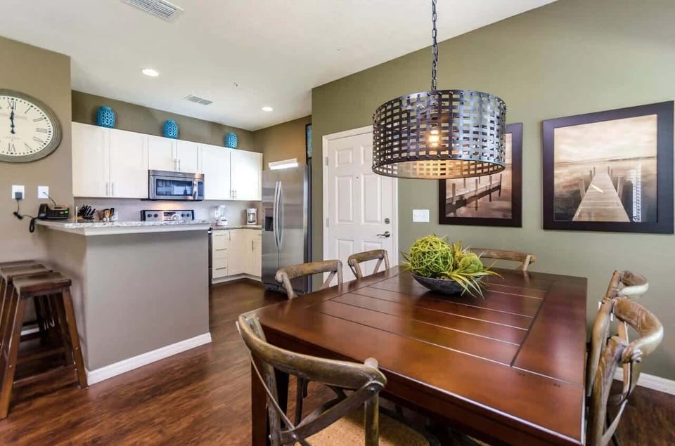 Work or dine in style! This multi-functional area offers both a dining table and office space.