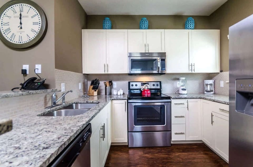 Modern kitchen, fully equipped for your culinary creations.