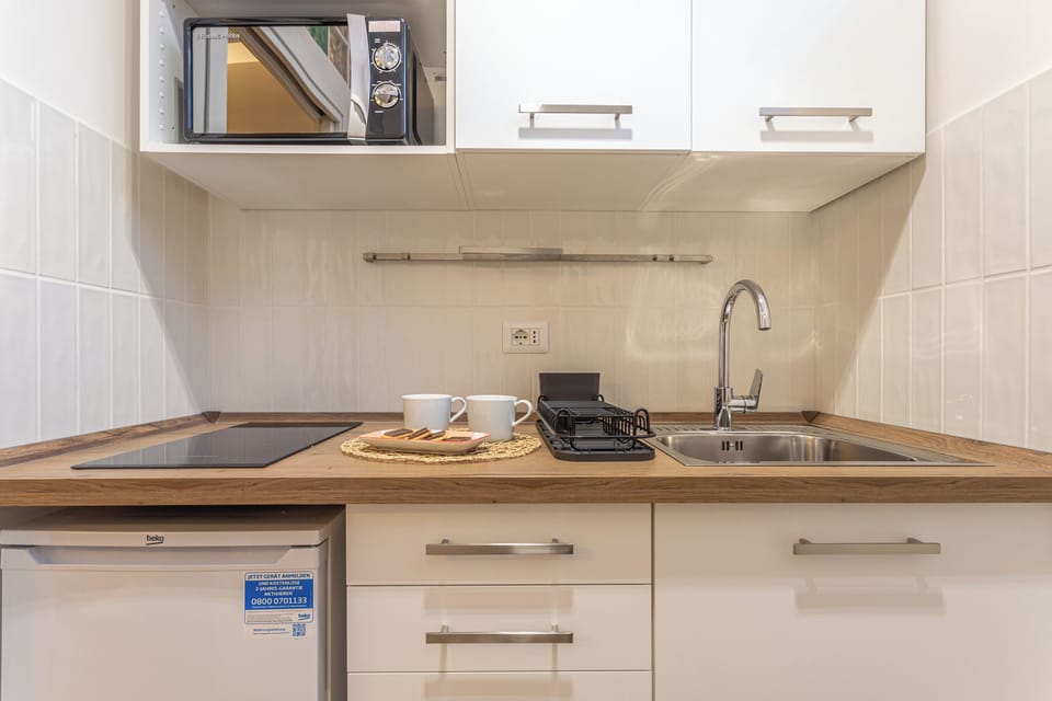 Mini-fridge, microwave, stovetop, toaster