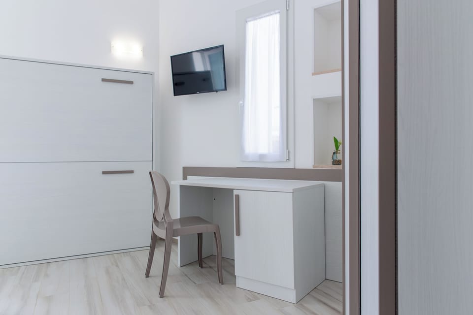 Family Room, Balcony, City View | In-room safe, soundproofing, free WiFi