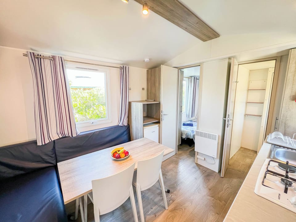 Comfort Mobile Home | Private kitchen | Fridge, stovetop, highchair, cookware/dishes/utensils