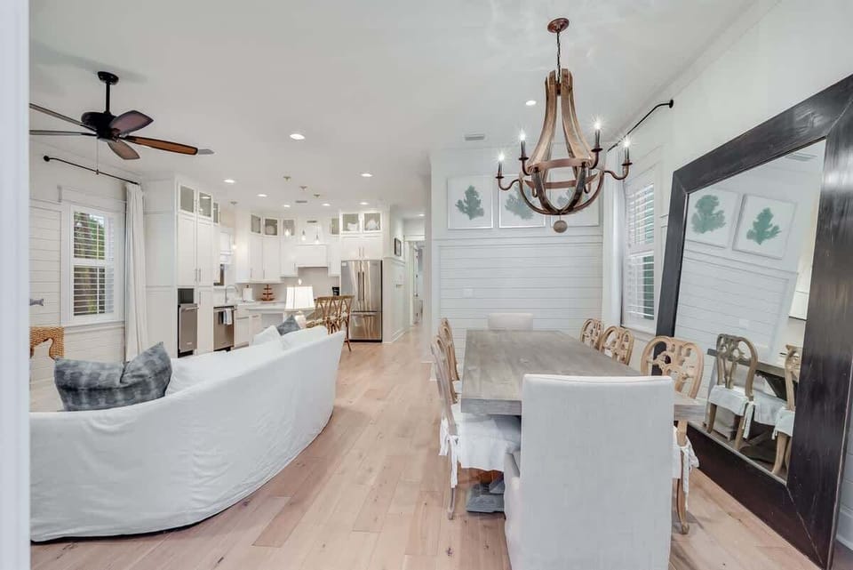 - Open concept living and dining area, perfect for socializing - Seamless transition from the living room to the spacious dining area, ideal for family gatherings - Enjoy the elegant lighting & thoughtful design that create a warm & inviting atmosphe