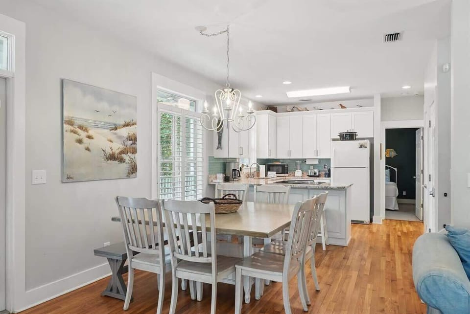 - Dine together just steps away from a bright, well equipped kitchen that makes cooking feel easy - Space blends comfort with function, ideal for homemade meals or takeout nights - Large windows & cozy seating set the tone for every shared bite