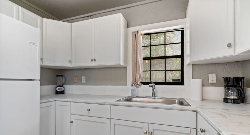 Whisking you a cozy stay in this kitchenette made for mixin’ and minglin