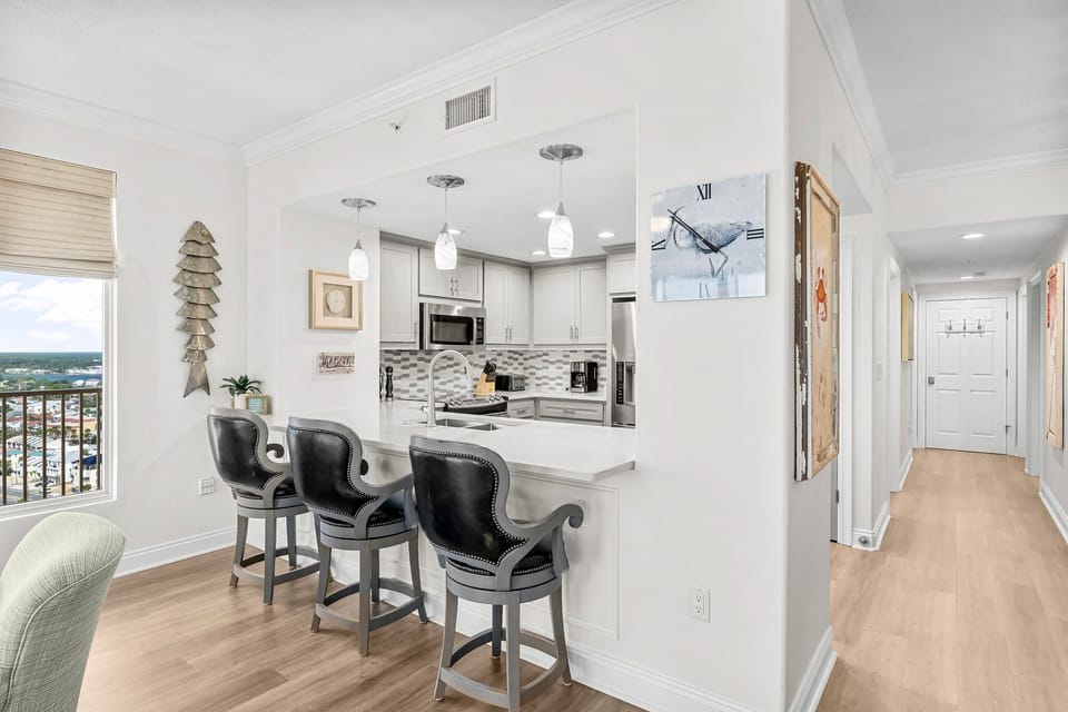 Modern kitchen with a breakfast bar and city views