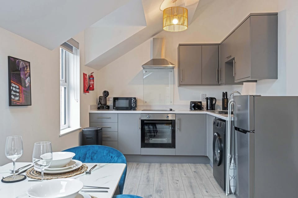 Well equipped Kitchen with washing machine, oven, hob, microwave, fridge, kettle, toaster, coffee maker and utensils