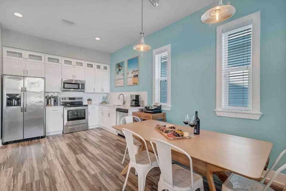 Dining area that easily sits up to six guests and set adjacent to the kitchen for easy access