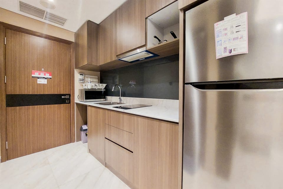 Apartment | Private kitchen | Fridge, stovetop, rice cooker, cookware/dishes/utensils