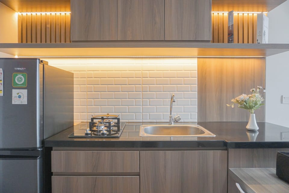 Apartment | Private kitchen | Fridge, stovetop, rice cooker, dining tables