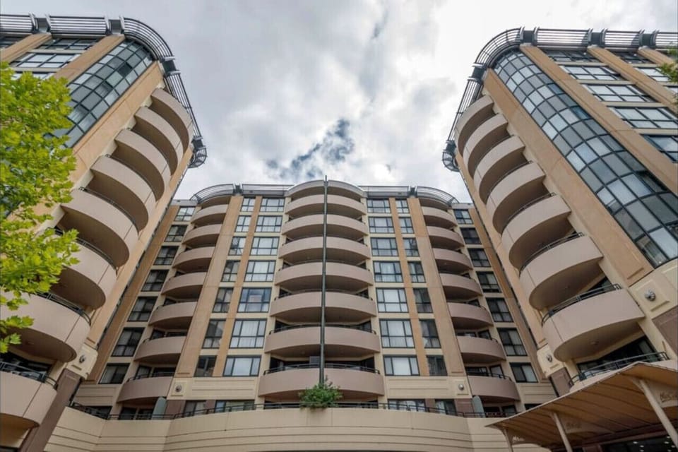 The distinguished facade of the building showcases a refined and modern architectural style.