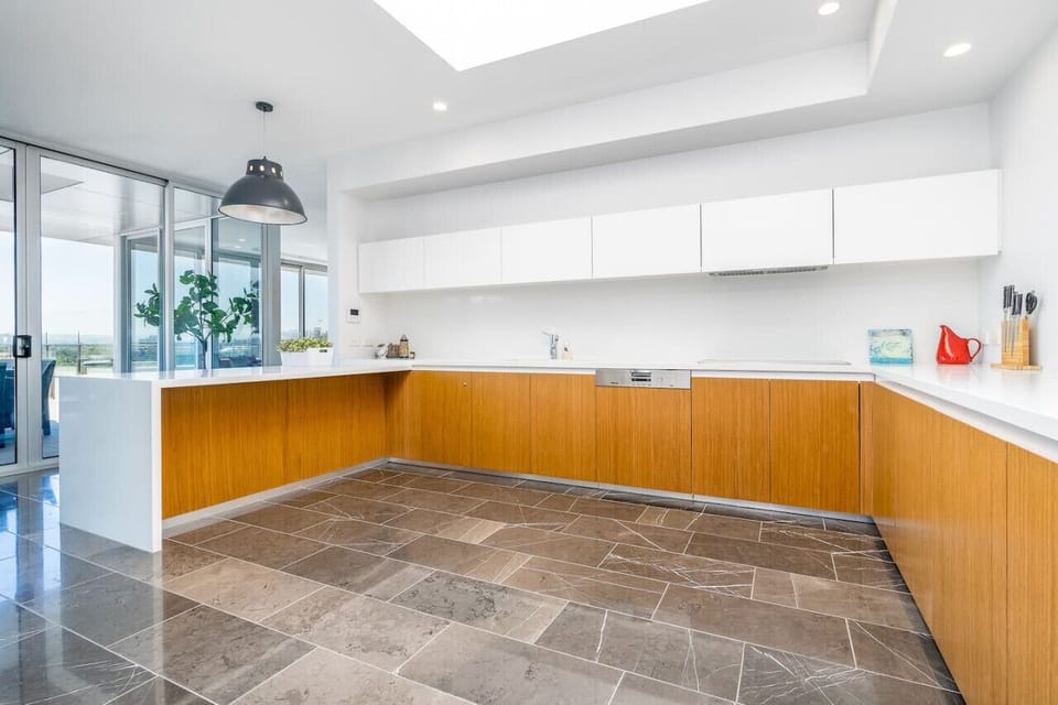 Experience the convenience of a generously sized kitchen, featuring plenty of room for cooking and meal prep. The expansive layout ensures you have all the space you need.