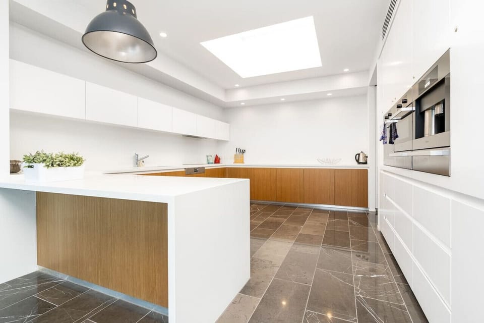 Experience the convenience of a generously sized kitchen, featuring plenty of room for cooking and meal prep. The expansive layout ensures you have all the space you need.