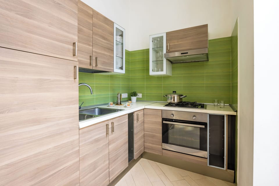 Family Apartment, Balcony | Private kitchen | Electric kettle