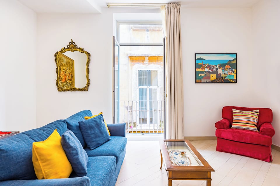 Family Apartment, Balcony | Living area | 35-inch TV with digital channels