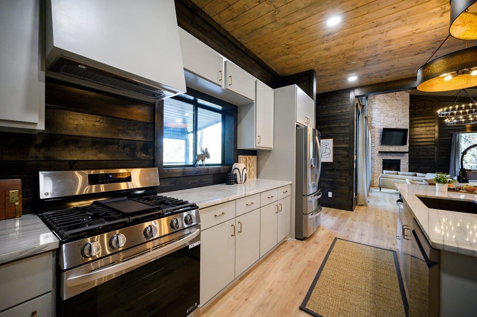 Kitchen: Culinary adventures await in this stylish, sunlit space with modern finishes!