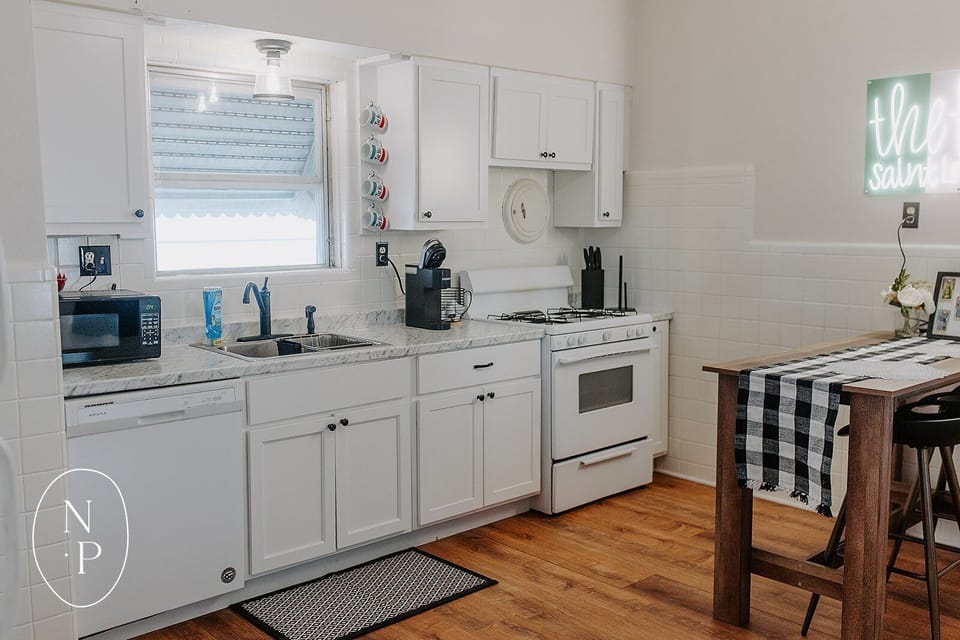 Fully equipped kitchen. Pans, silverware, cooking utensils, appliances, + more
