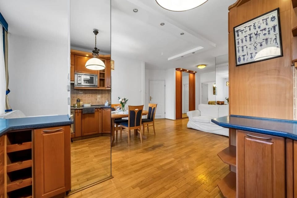 Open-Concept Living Room with Kitchen | Book Now with RENTUJEMY.COM