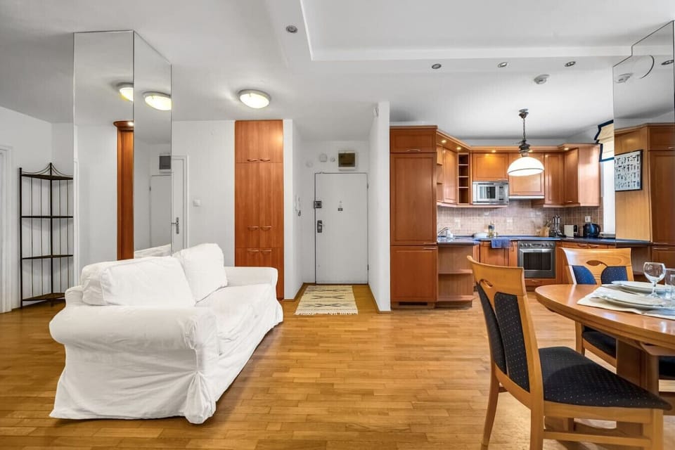 Open-Concept Living Room with Kitchen | Book Now with RENTUJEMY.COM