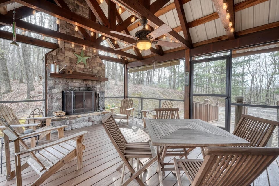 Beautiful setting—morning coffee by the fire on the screened porch